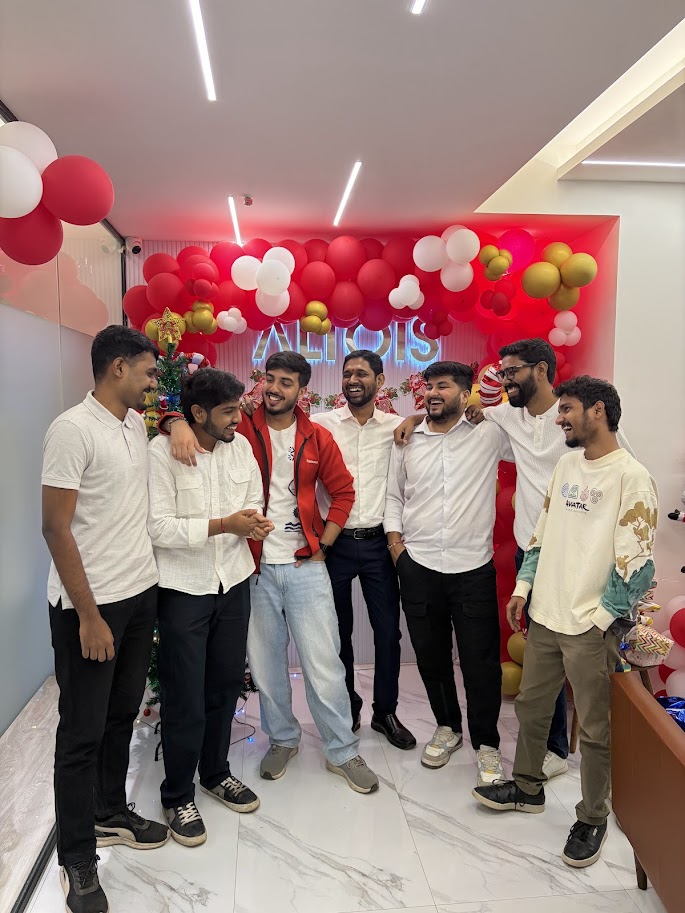 Altois team Christmas celebration with balloons and tree